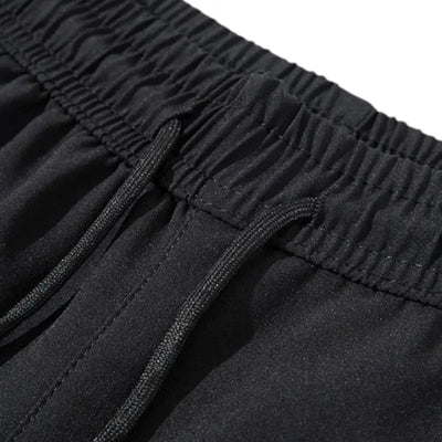 Pantalon trekking coupe-vent